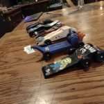 Toy cars made in pinewood derby workshop class at Craftsman Ave