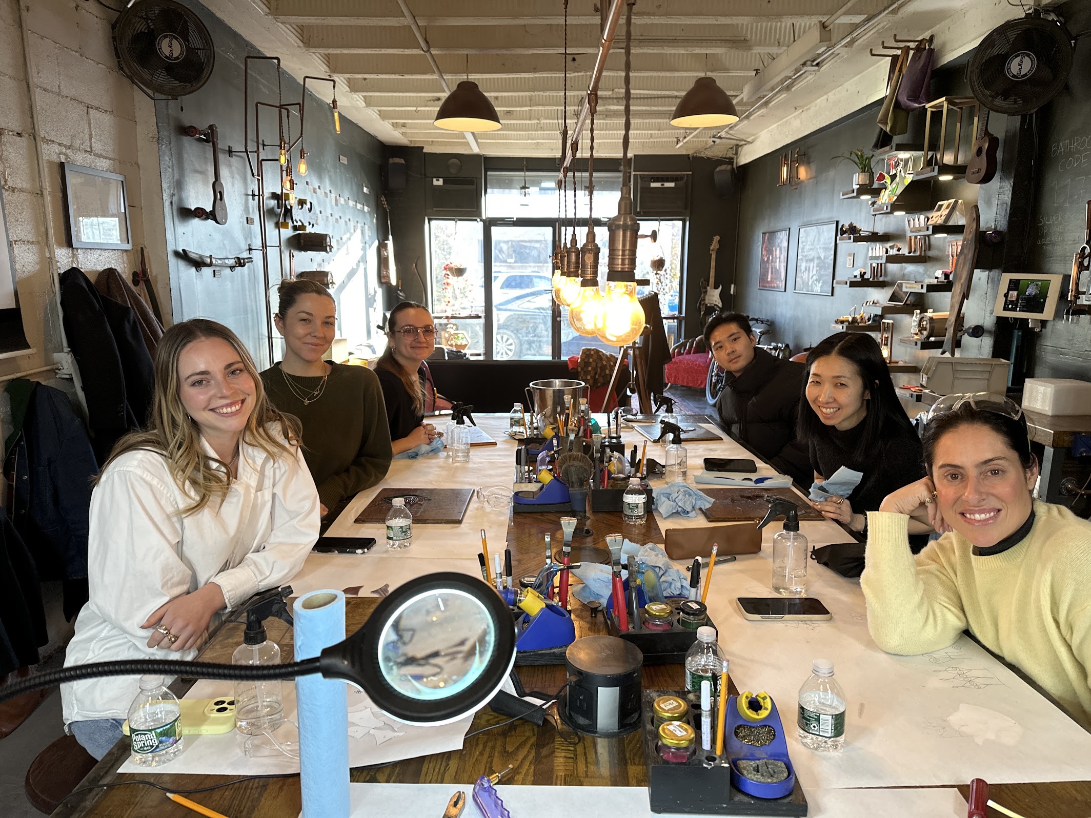people smiling during a group workshop at craftsman ave